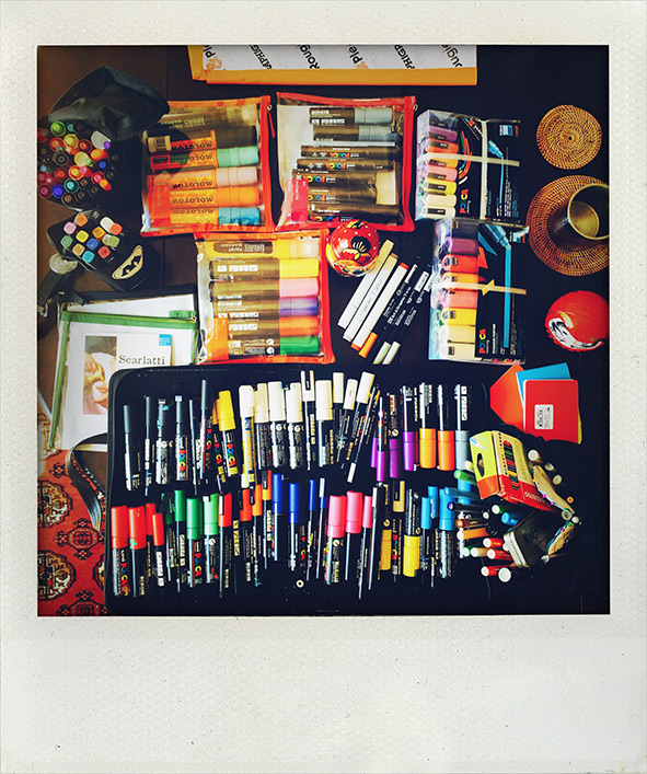 Polaroid image of Didier's colorful toolbox